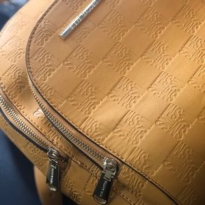 Yellow Steve Madden backpack